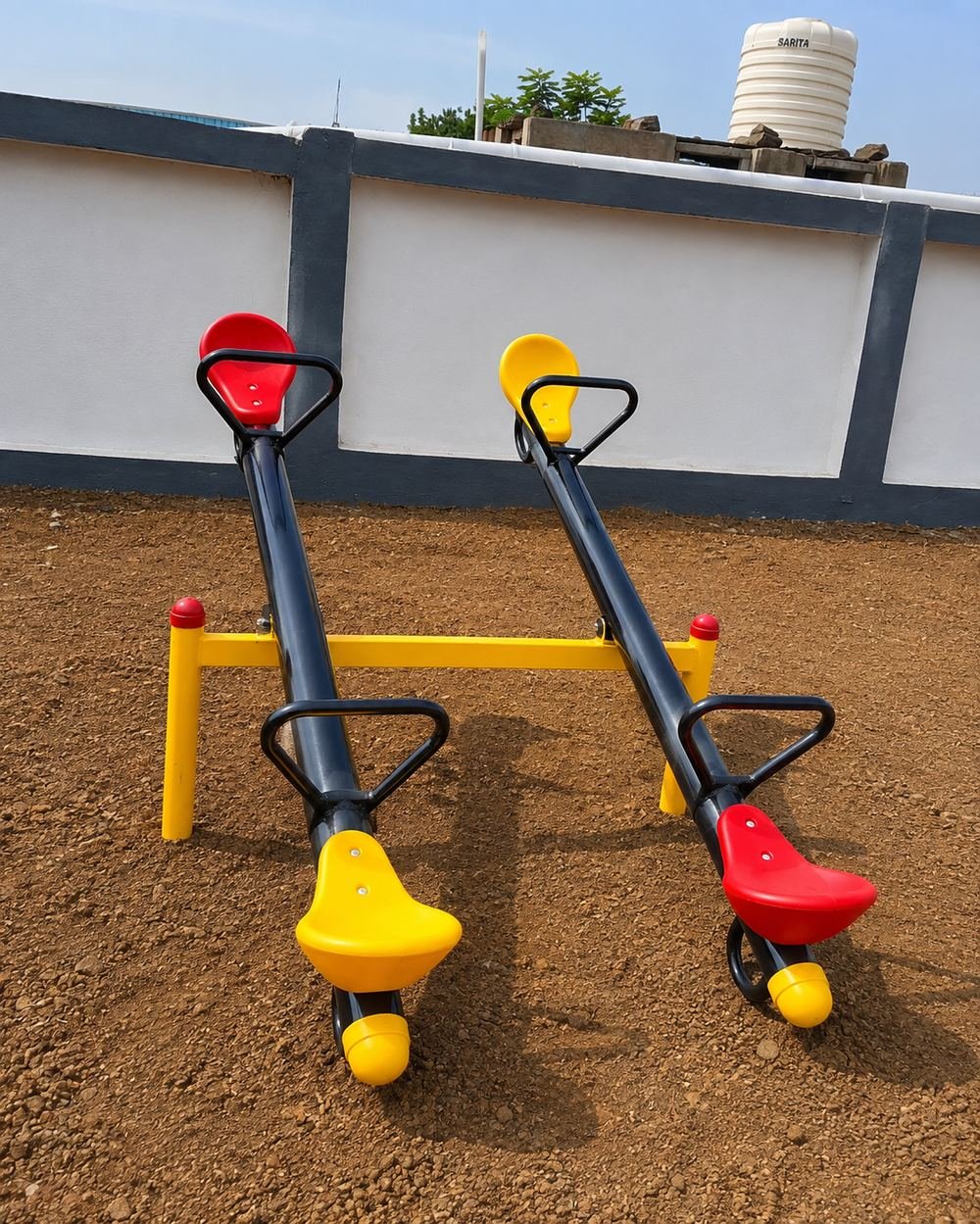 Double seesaw at Anokha Gaon